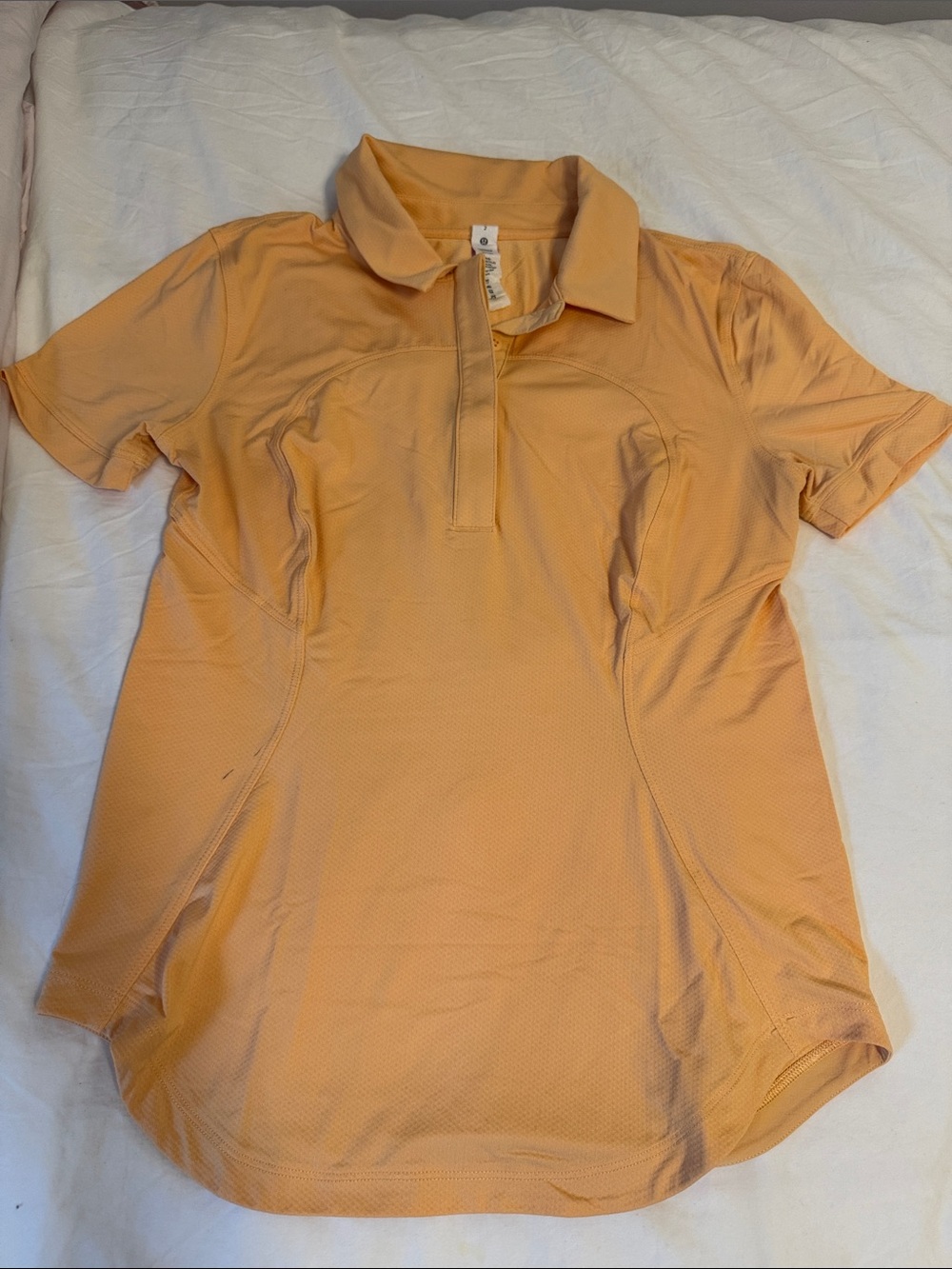 Lululemon Women’s Short Sleeve Polo Top in Peach size 2